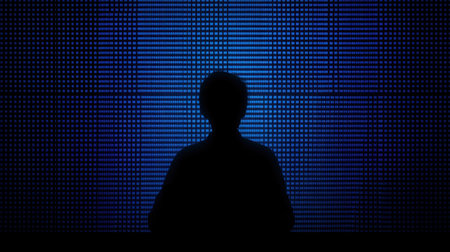 The image shows the silhouette of a person against a vibrant LED screen in blue tones, creating a captivating scene that evokes themes of technology and creativity.の素材