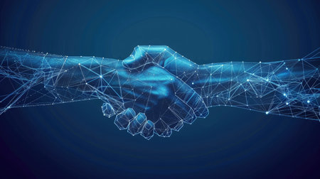 Futuristic business partnership concept. Abstract digital handshake with two hands formed by lines, dots, and geometric shapes on a blue tech background, symbolizing connectivity and teamworkの素材
