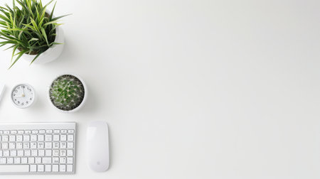 Minimalist workspace with a clean desktop, keyboard, and mouse, ready for text overlayの素材