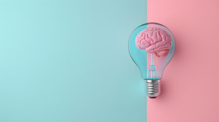 Abstract representation of brainstorming and creativity with a brain inside a transparent light bulb, against a soothing blue and pink pastel background. Copy space available for custom textの素材