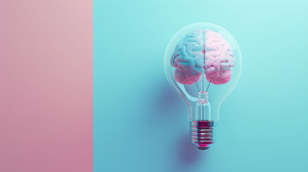Creative concept of a brain inside a transparent light bulb on blue and pink pastel background, symbolizing brainstorming and inspiration. Ample copy space for text or designの素材