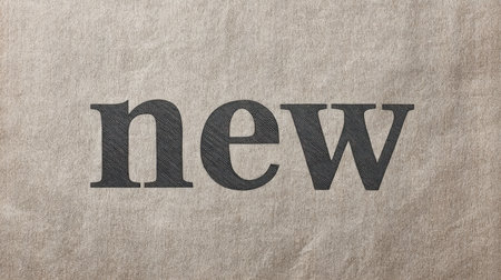 This artistic collage features a textured gray newspaper background with bold typography. Perfect for creative projects, graphic design, and modern art applications.の素材