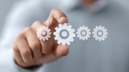 A business professional engages with transparent gears, representing teamwork and innovation processes. This image captures modern growth and collaboration dynamics.の素材