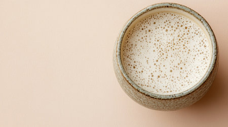 Japanese drink in a traditional cup, on a clean, neutral backdrop, perfect for product promotion or adding design elements, with space for textの素材