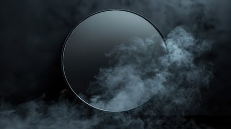 Round mirror suspended in front of a black backdrop, with thick smoke drifting across, creating a moody, ethereal scene.の素材