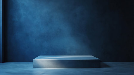 A minimalist display pod sits on a smooth floor, illuminated by soft lighting against a dark blue wall, creating a serene and artistic atmosphere perfect for showcasing products.の素材