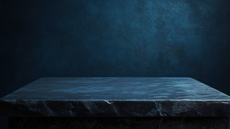 A striking dark marble surface rests against a smooth blue backdrop, providing an ideal setting for showcasing various products or artistic creations in a refined manner.の素材
