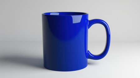 A vibrant blue ceramic mug on a plain background, perfect for showcasing beverage options. Ideal for promotion or kitchen decor, combining simplicity with modern design.の素材