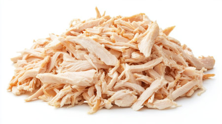 A close-up view of shredded cooked chicken ideal for meal preparation, healthy recipes, and culinary uses, showcasing the texture and color of this versatile ingredient.の素材