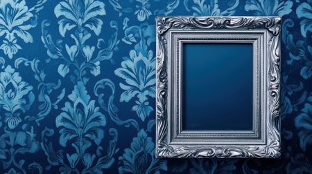 This image features an elegant vintage frame set against a rich blue damask wallpaper, perfect for showcasing artwork or photographs with a touch of sophistication.の素材