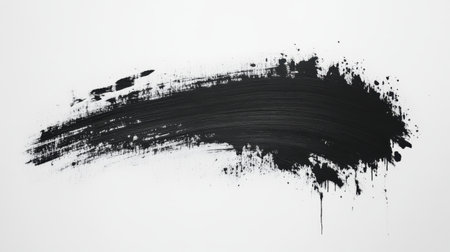 A bold and dynamic black paint brush stroke on a clean white background. This artistic design element offers versatility for creative projects and modern aesthetics.の素材