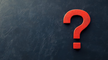 A striking red question mark symbol isolated on a dark background, representing curiosity and inquiry. Ideal for conceptual and creative projects.の素材
