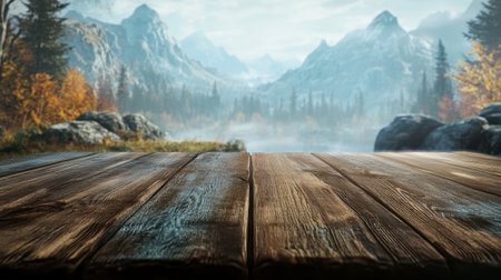 A beautiful landscape featuring a wooden tabletop in the foreground with a stunning mountain view, colorful foliage, and serene lake in the background.の素材