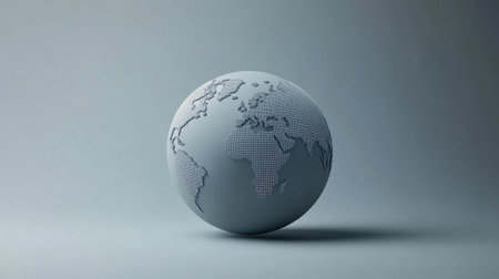 A beautifully crafted monochrome globe featuring dotted continents, perfect for themes of global awareness, travel, education, and minimalist design aesthetics.の素材