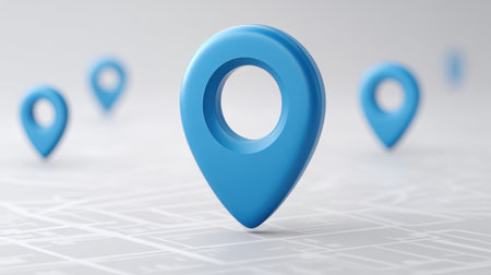 A stunning blue geotag icon stands prominently on a minimalist map background, representing modern navigation technology and location services for travel and exploration.の素材