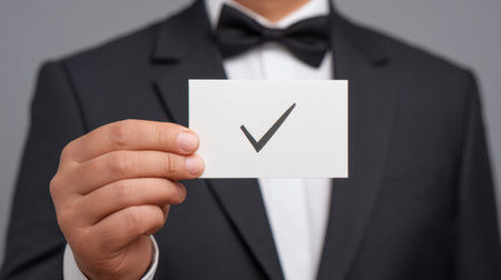A professional individual dressed in formal attire, confidently holding a certificate with a checkmark, symbolizing success and achievement in a virtual offer setting.の素材