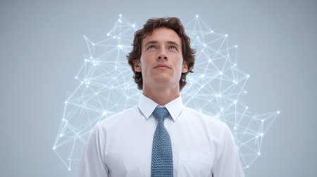 A focused businessman stands confidently with a serene expression, surrounded by intricate digital network lines, symbolizing innovation and connectivity in contemporary business.の素材