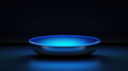 This captivating image features a futuristic blue neon dish. Its glossy surface reflects ambient light, creating an elegant and modern atmosphere ideal for artistic displays.の素材