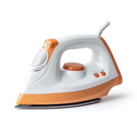 This modern electric iron features a sleek design with orange accents, designed for effective wrinkle removal and smooth finishing on various fabrics at home.の素材