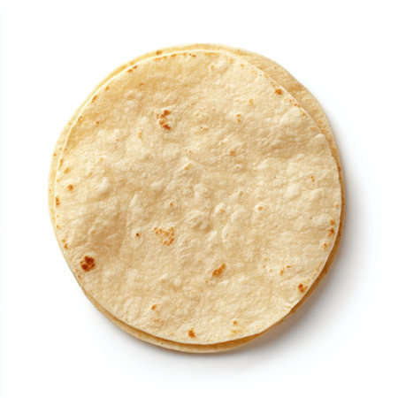 Soft flour tortillas stacked neatly on a clean surface, perfect for culinary creations such as tacos, burritos, or enchiladas, showcasing authentic Mexican cuisine.の素材