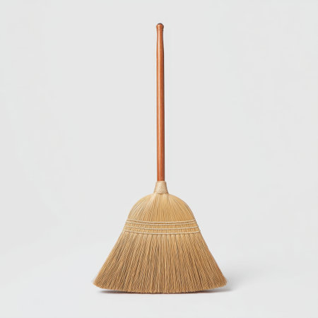 This traditional broom features natural straw bristles and a sturdy wooden handle, perfect for home cleaning and maintenance. A classic tool for tidy spaces.の素材