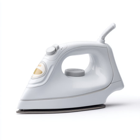 This compact white iron features steam functionality for effective wrinkle removal and is suitable for various fabric types, ensuring a polished look for your garments.の素材