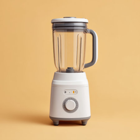 Stylish blender with a transparent jar and easy-to-use dials, perfect for creating smoothies, sauces, and soups, enhancing any modern kitchen setup.の素材