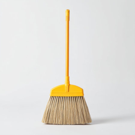 This bright yellow cleaning broom features soft bristles that effectively tackle dirt and dust, making it a perfect addition to any cleaning routine for home or office use.の素材