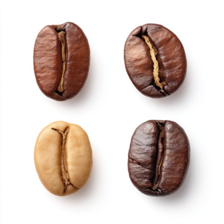 This image features an artistic arrangement of different coffee beans showcasing their colors and textures, perfect for culinary and beverage design projects.の素材