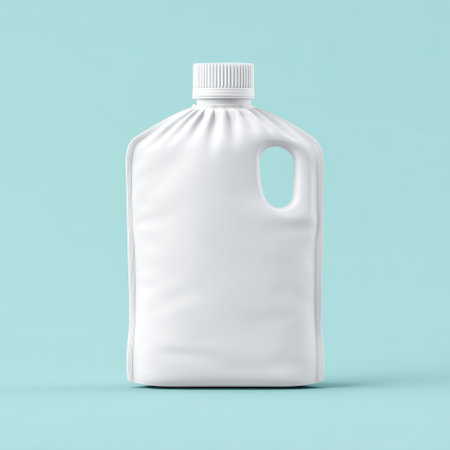 A sleek and minimalist white plastic bottle on a light blue background, ideal for branding and packaging design. Perfect for showcasing various product ideas.の素材