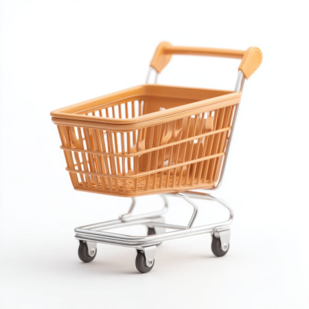 This image features a vibrant orange shopping basket on a clean white background, perfect for illustrating retail, marketing, or e commerce themes and promotions.の素材