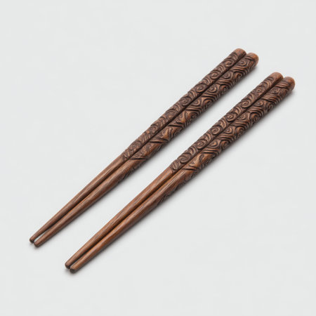 Discover beautifully handcrafted wooden chopsticks featuring intricate designs. Perfect for enhancing Asian dining experiences or as a stylish home decor item.の素材