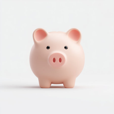 A charming pink piggy bank sits against a bright white backdrop, symbolizing savings and financial awareness, perfect for projects focusing on money management themes.の素材