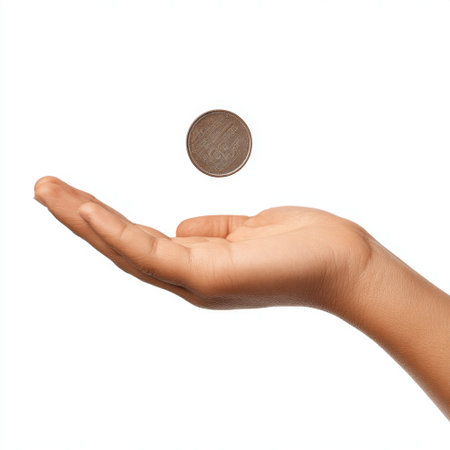 A detailed close-up image showcasing a hand with palm open, holding a shiny coin above it. This visual represents themes of wealth, currency, and financial transactions.の素材