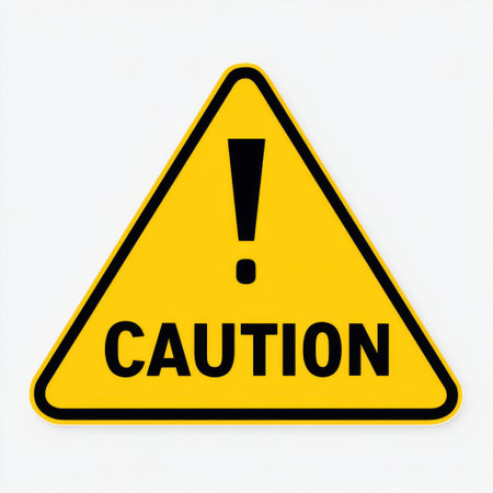 This image features a yellow triangular caution sign with black lettering, promoting awareness of potential hazards and ensuring safety in diverse settings.の素材