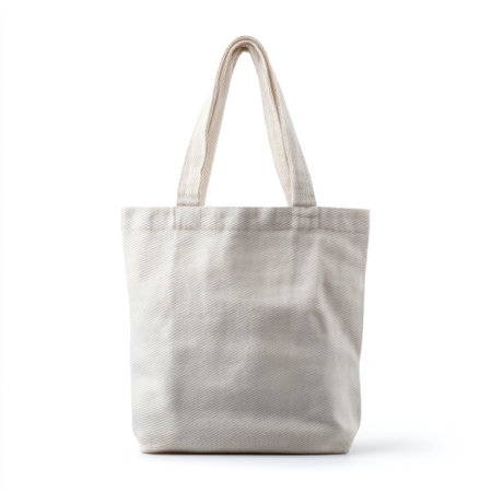 This neutral tone canvas tote bag is perfect for shopping, carrying essentials, or daily use. Its versatile design makes it a stylish accessory for any occasion.の素材