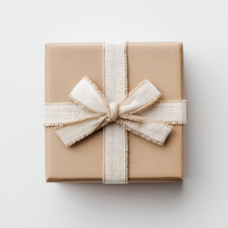 A beautifully wrapped gift box featuring a lovely ribbon, ideal for various celebrations and special occasions, enhancing the element of surprise and joy.の素材