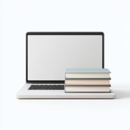 A clean and modern workspace featuring a laptop with a blank screen and neatly stacked books symbolizing education, productivity, and minimalist design aesthetic.の素材