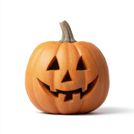 A bright orange pumpkin features a charming smiling face with sharp teeth, perfect for Halloween decorations or autumn festivities, capturing the playful spirit of the season.の素材