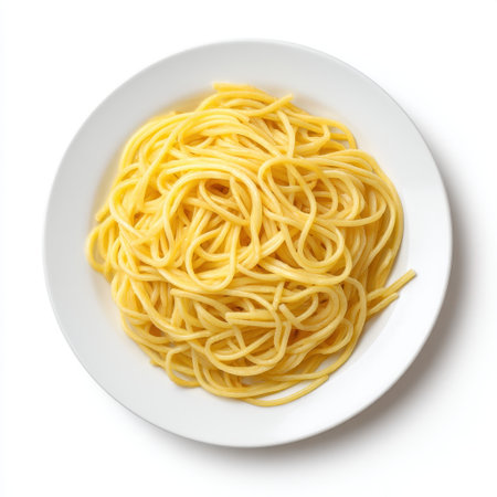 This image features a generous serving of freshly cooked spaghetti noodles arranged neatly on a white plate. Ideal for culinary projects and recipe inspirations.の素材