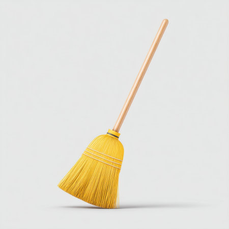 A vibrant yellow broom featuring a sturdy wooden handle, ideal for efficient household cleaning. Perfect for dusting and keeping spaces neat and tidy.の素材