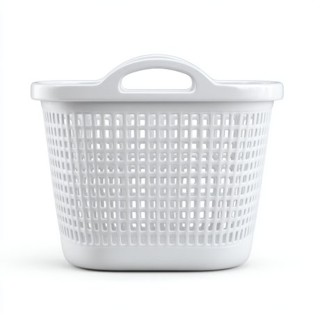 A clean, white plastic laundry basket designed for practicality and style, featuring ergonomic handles for easy carrying and perfect for storing laundry or household items.の素材
