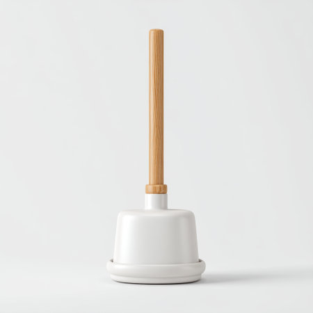 A minimalist white toilet plunger featuring a natural wood handle, ideal for home cleaning tasks and essential sanitation needs in bathrooms or restrooms.の素材