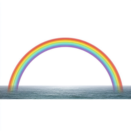A stunning rainbow gracefully arcs over calm ocean waters, creating a vivid display of color against the serene backdrop of the sky and horizon.の素材