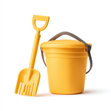 A vibrant yellow bucket paired with a matching shovel, ideal for beach outings, gardening, and outdoor fun. Perfect for encouraging playful learning and creativity in children.の素材