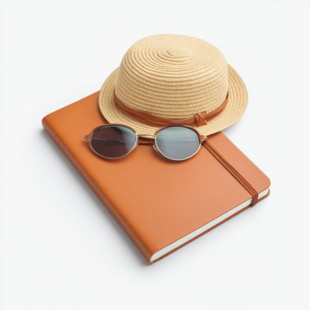 A captivating flat lay image featuring a straw hat, stylish sunglasses, and a leather notebook, perfect for summer vacation planning and relaxation.の素材