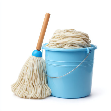A visually appealing setup of a blue mop bucket with a mop head, ideal for home and office cleaning tasks, emphasizing organization and hygiene.の素材