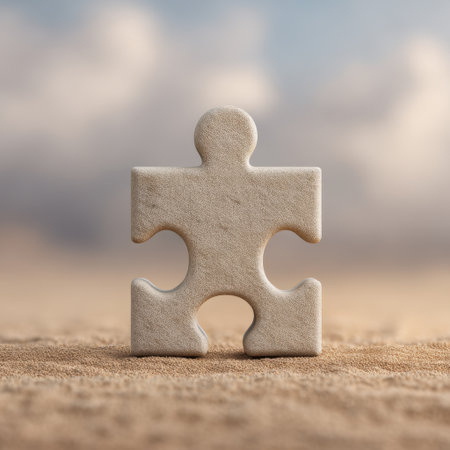 A striking white puzzle piece stands alone on a sandy surface, symbolizing individuality and connection in a peaceful and minimalist natural setting.の素材