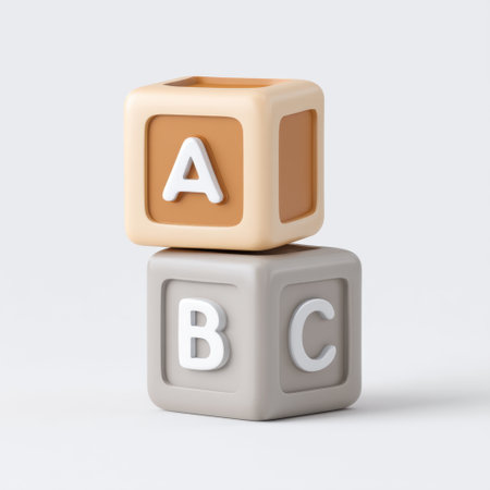 Two colorful alphabet blocks with letters A and B stacked creatively against a soft light background, perfect for illustrating childhood learning and play.の素材