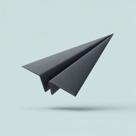 A sleek black paper airplane hovers with elegance against a soft pastel background. This image symbolizes freedom, creativity, and the essence of innovative thinking.の素材